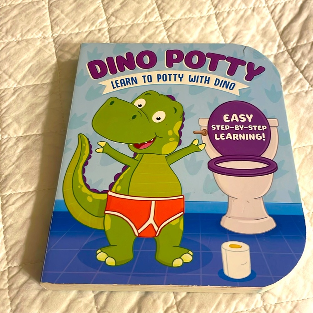 Dino Potty Training hard cover and pages book.